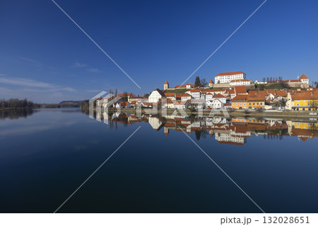 Ptuj castle and old town reflecting in Drava river, Slovenia Ptuj castle and old town reflecting in Drava river, Slovenia 132028651