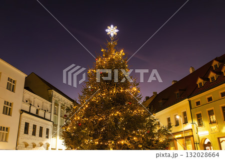 Christmas tree glowing in Znojmo town square at night 132028664