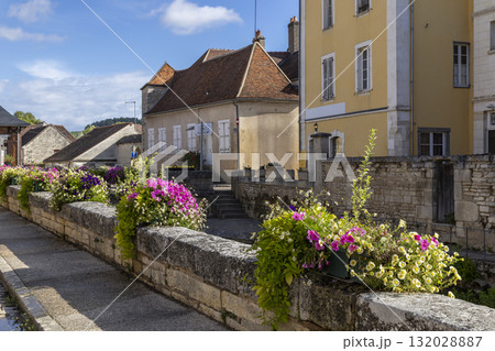Stone bridge with vibrant flowers in Europe 132028887