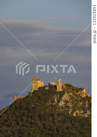 Staatz castle ruins glowing under sunset sky Staatz castle ruins glowing under sunset sky 132028891