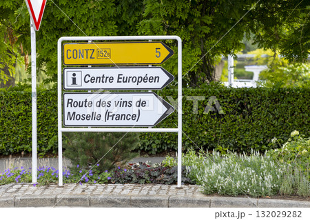 Schengen road sign pointing to Centre Europeen and Moselle wine route 132029282