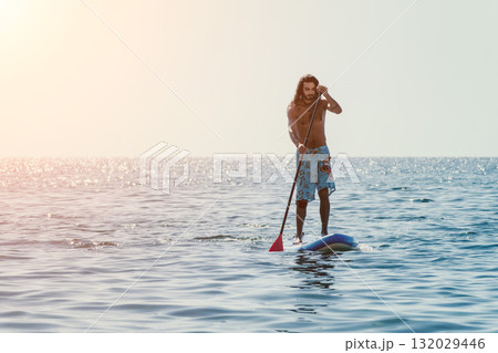 Man Paddleboarding Ocean Water Sport Sunset Paddleboard Man Paddleboarding Ocean Water Sport Sunset Paddleboard 132029446