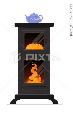 Old fashioned black wood stove with burning fire and oven with loaf of bread inside, topped with a blue teapot. Alternative energy in an extreme energetical situation. 132030471