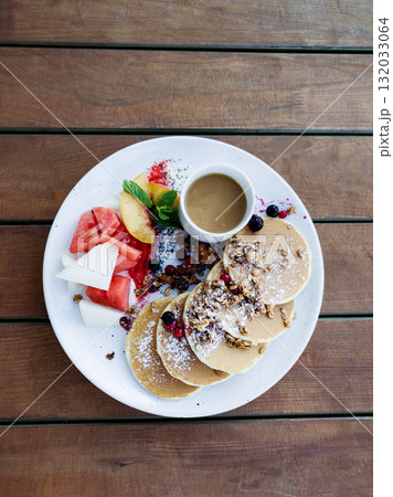 stack of pancakes on a plate 132033064