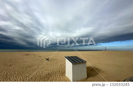 A Serene Beach Landscape Appearing Beneath Dramatic Clouds and Captivating Skies A Serene Beach Landscape Appearing Beneath Dramatic Clouds and Captivating Skies 132033285