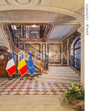 Paris, France - May 18, 2025: Hotel de Behague in Paris, which currently houses the Embassy of Romania to France. The country flags alongside the EU are displayed at the entrance 132034453