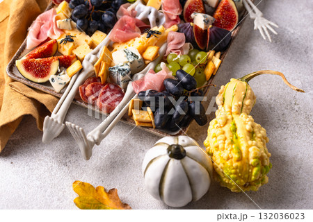 Assortment of cheese and meat appetizers Assortment of cheese and meat appetizers 132036023