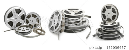Vintage Film Reels and Strips Arranged in Three Groupings Featuring Metal Spools and Loose Coiled Film on White Background Representing Classic Cinema Media Vintage Film Reels and Strips Arranged in Three Groupings Featuring Metal Spools and Loose Coiled Film on White Background Representing Classic Cinema Media 132036457