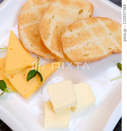 Cheese toast butter bold grilled cheese on pink background Cheese toast butter bold grilled cheese on pink background 132037368