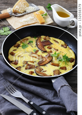 tasty porcini mushroom parmesan omelette, top view 132038379