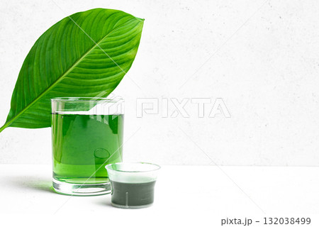 Liquid Chlorophyll Drink. Glass of Green Chrorophyll Water. 132038499