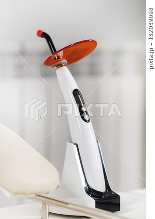 Dental cleaning tool with modern design displayed in a dental clinic for professional cleanings and treatments Dental cleaning tool with modern design displayed in a dental clinic for professional cleanings and treatments 132039098