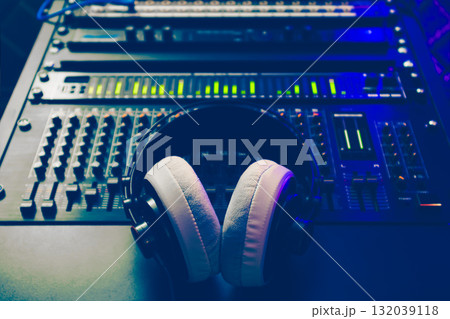 headphone on audio mixer in home studio headphone on audio mixer in home studio 132039118