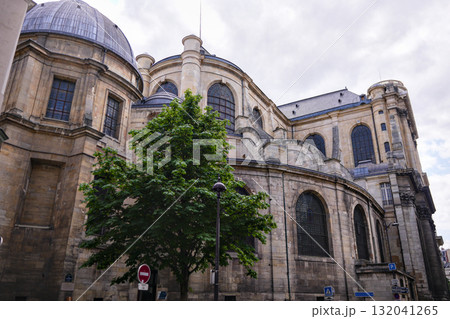 Historic stone church with domes and arched windows in Paris Historic stone church with domes and arched windows in Paris 132041265