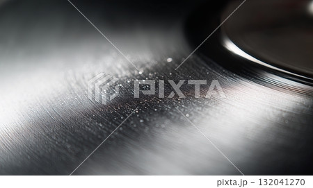 Vinyl record with noticeable scratches on the surface viewed up close Vinyl record with noticeable scratches on the surface viewed up close 132041270