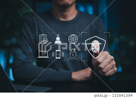 Cybersecurity and Biometric Identity Authentication System. Person using fingerprint scanning technology with icons represent security protocols, data protection, access control, identity verification 132041394