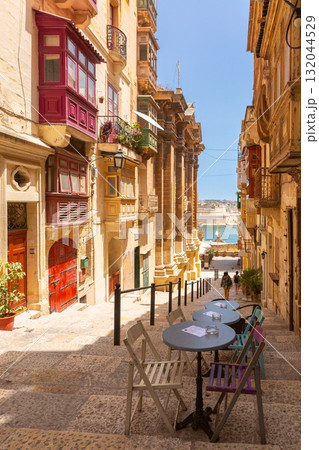 Traditional Balconies on a Stepped Street in Valletta Malta Traditional Balconies on a Stepped Street in Valletta Malta 132044529