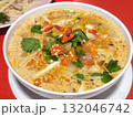 Bowl of Spicy and Savory Thai Tom Yum Goong Soup 132046742