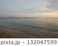 Calm Ocean Scene at Sunset with buoy in the sea 132047599