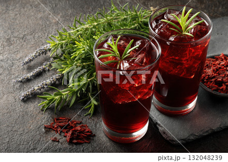 Hibiscus iced tea with lavender sprigs in flat lay arrangement 132048239