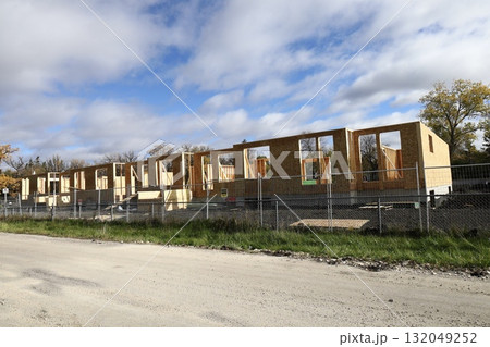 Wood frame house under construction site Wood frame house under construction site 132049252