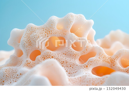 Textured foam formation with abstract shapes and soft colors on a light blue background Textured foam formation with abstract shapes and soft colors on a light blue background 132049430