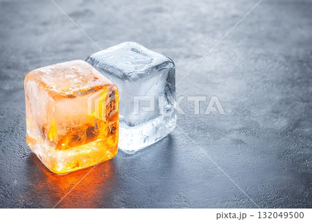 Ice Cubes with Unique Colors on Dark Background for Creative Beverage and Food Photography 132049500
