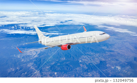 White passenger airplane flying in the sky White passenger airplane flying in the sky 132049756