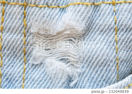Old denim blue jeans fabric texture background close up 132049839