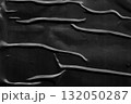 black crumpled and creased plastic poster texture background 132050287