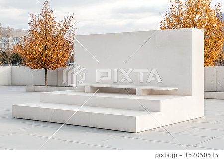 Minimalist Outdoor Space with Modern White Bench and Orange Trees in Urban Setting Minimalist Outdoor Space with Modern White Bench and Orange Trees in Urban Setting 132050315