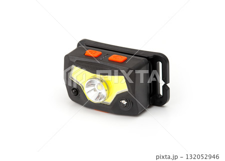 Black headlamp with orange buttons isolated on a white background. 132052946