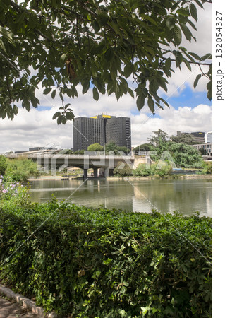 artificial lake at eur district in rome with bridge and modern buildings 132054327