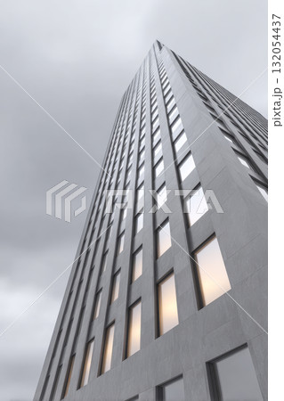 Modern building with large windows against a cloudy sky 132054437