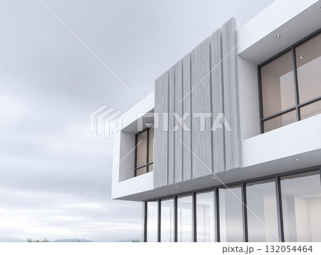 Modern building with large windows against a cloudy sky Modern building with large windows against a cloudy sky 132054464