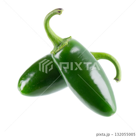 Fresh jalapeno pepper isolated on white background. Slices of green hot serrano pepper. Clipping path. Fresh jalapeno pepper isolated on white background. Slices of green hot serrano pepper. Clipping path. 132055005