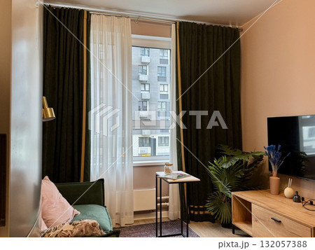 modern living room in a stylish interior of a new apartment with designer renovation 132057388