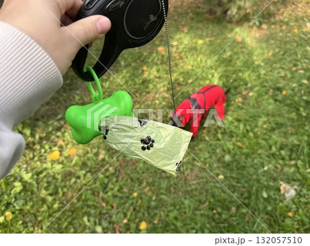 Bags for dog excrement on a tape measure Bags for dog excrement on a tape measure 132057510