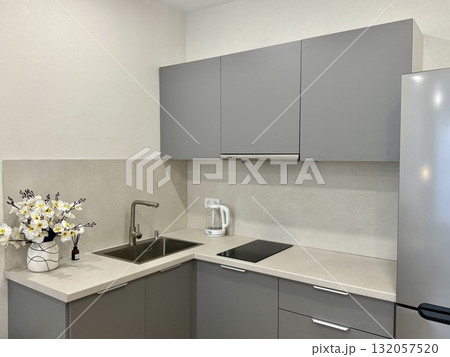 new stylish kitchen set in a modern apartment interior new stylish kitchen set in a modern apartment interior 132057520