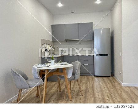 new stylish kitchen set in a modern apartment interior new stylish kitchen set in a modern apartment interior 132057528