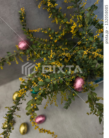 Easter eggs and mimosa branches celebrating orthodox easter in prague gray background Easter eggs and mimosa branches celebrating orthodox easter in prague gray background 132058085