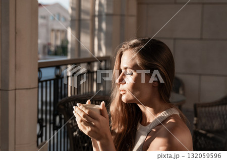 Woman Coffee Balcony Enjoying Morning Sunlight 132059596