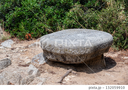 Large flat boulder. 132059910