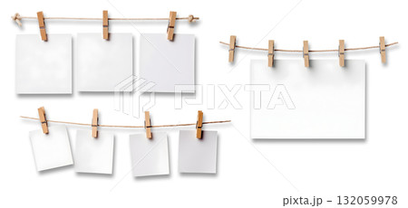 White blank empty paper sheet attached with wooden wood pegs on string on transparent background cutout, PNG file. Mockup template for artwork design. Many assorted different sets varieties 132059978