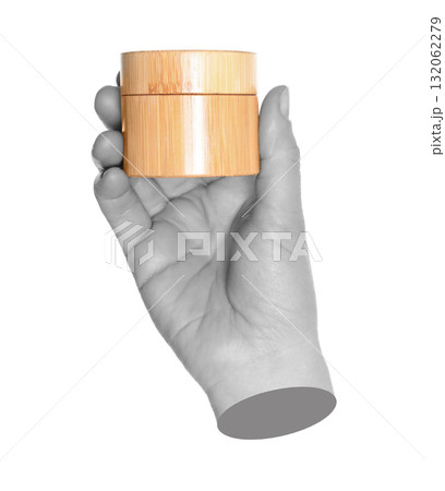 Woman hand holds bamboo cream jar, isolated on transparent background, natural and eco cosmetics concept. Contemporary art concept 132062279
