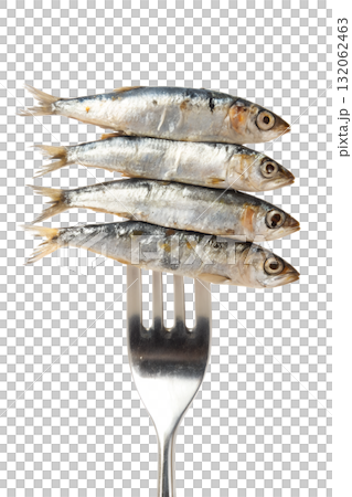 Four fresh, whole sardines stacked on a silver fork, healthy seafood ingredient isolated on a transparent background 132062463