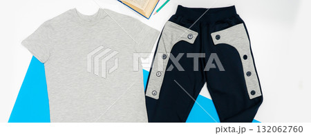 Blank male and female round neck raglan t-shirt and sweatpants in front, back views. Clothing templates. Fashion set. Casual, sport style. Active wear.  illustration. Isolated on white. 132062760