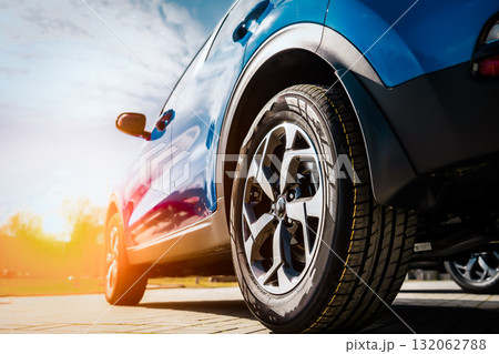 Blue Family business spotrs hatchback Car on sunset. Business success concept Blue Family business spotrs hatchback Car on sunset. Business success concept 132062788