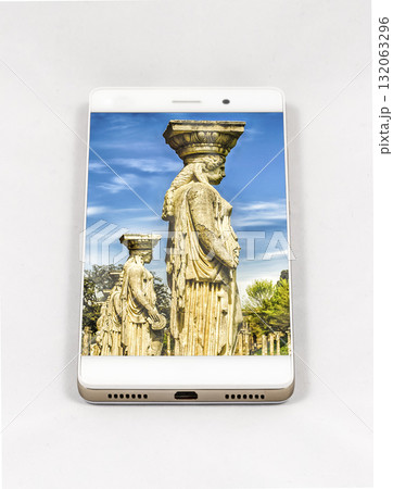 Smartphone displaying picture of Statues of the Caryatides, Tivoli, Italy Smartphone displaying picture of Statues of the Caryatides, Tivoli, Italy 132063296