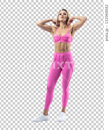 Athletic woman smiling, posing in pink fitness outfiton on transparent background Athletic woman smiling, posing in pink fitness outfiton on transparent background 132068082